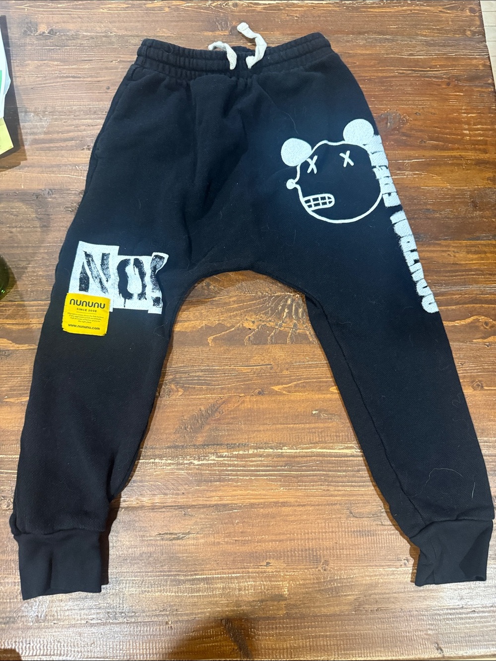 nununu Black Jogger Sweatpants with White Graphic